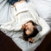 woman-trying-fall-asleep-bed
